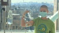 Jenna Strickland poses wearing a mask at the Bone Marrow Transplant Unit at NYP/Columbia.